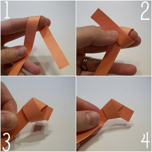 Делаем из ленты узелок - аккуратный пятиугольник